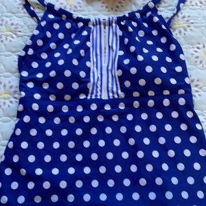 Blue white tankini bottoms are a med top is a 10